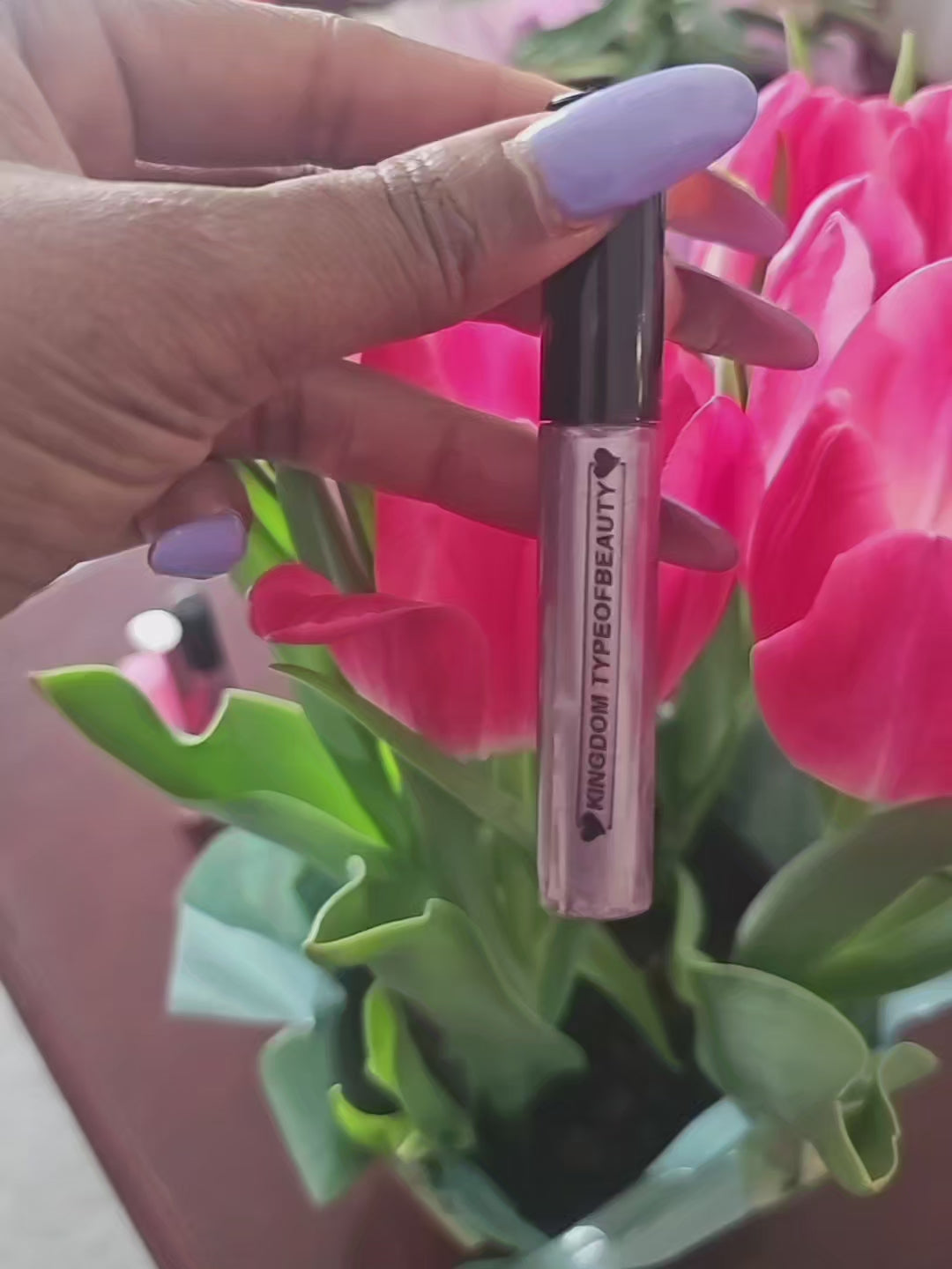 Shimmery, pastel purple lipgloss